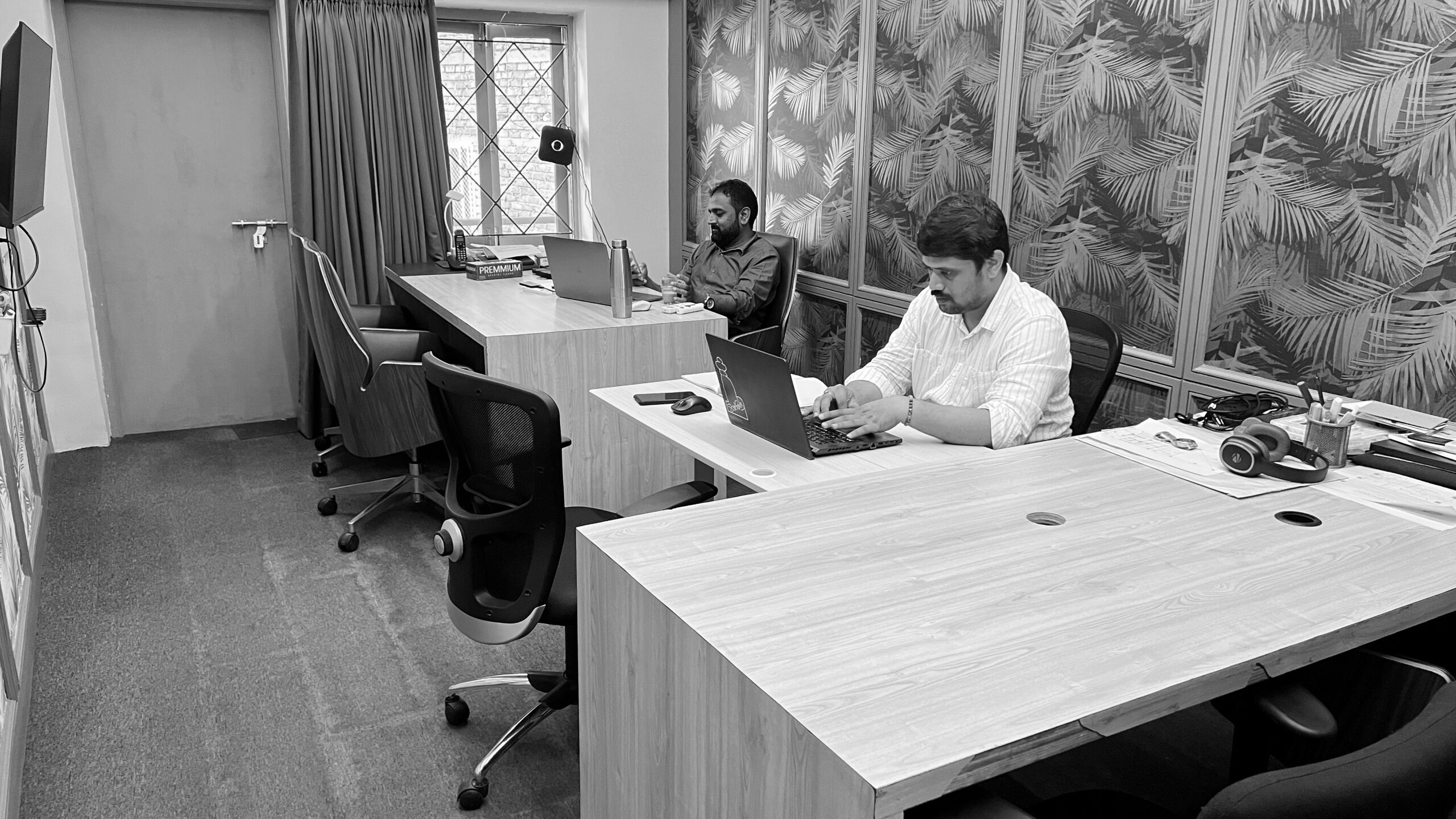 Office workspace with drafting desk
